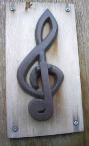 The old Polymorph Studio B G-clef door-knocker by Gabrielle Curry